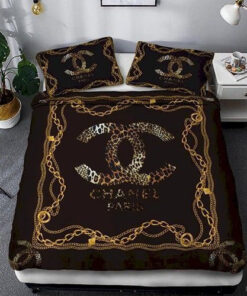 Chanel Logo Golden in Black Background Bedding Set